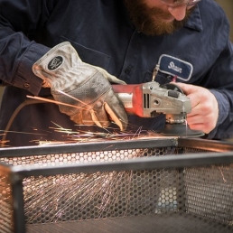 custom metal fabrication project grinding