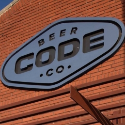 code beer metal sign